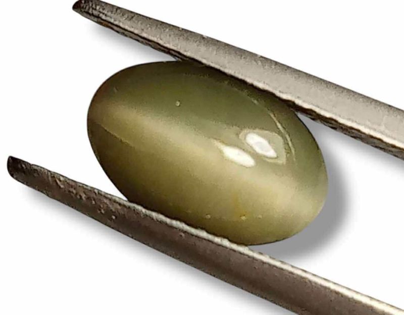 Фото Кварц с эффектом кошачьего глаза (Шри-Ланка) 