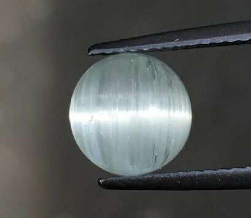 Фото Топаз голубой с эффектом кашачий глаз (Бразилия) 