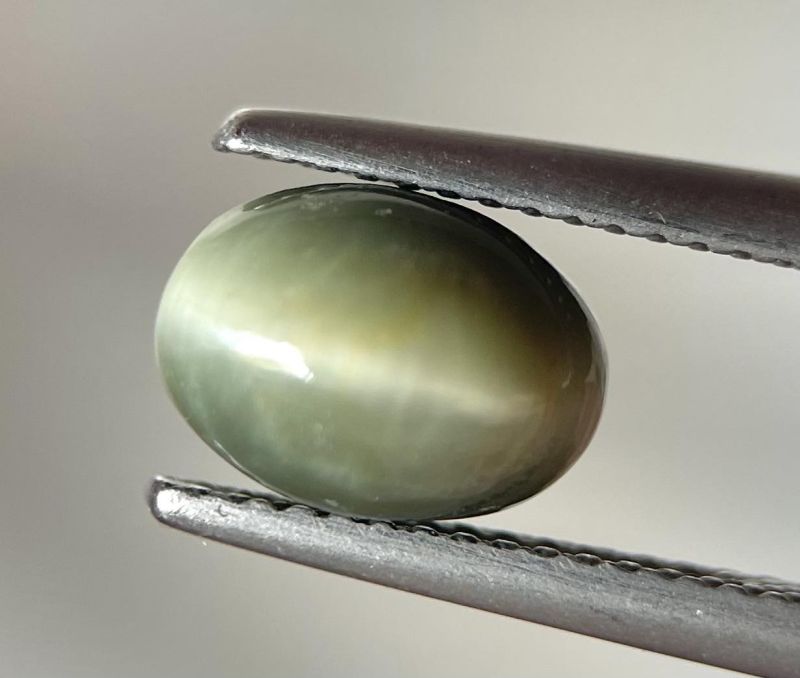 Фото Кварц с эффектом кошачьего глаза (Шри-Ланка) 