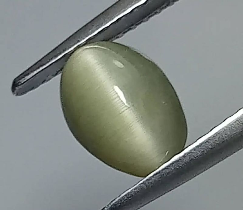 Фото Кварц с эффектом кошачьего глаза (Шри-Ланка) 